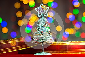 Christmas tree decoration ornament isolated on blurred background of  lights