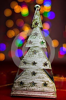 Christmas tree decoration ornament isolated on blurred background of  lights