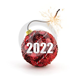 Christmas tree decoration. Red bomb ready to go off with golden sparkles on white background. New Year concept