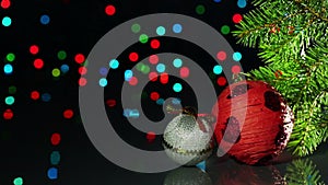 Christmas tree decorations balls on blinking background