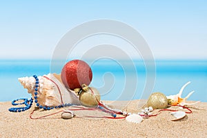 Christmas tree decorations on the beach in tropical. Concept of new year holiday in hot countries