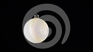 Christmas tree decorations on a black background. Festive Christmas balls on a dark, isolated