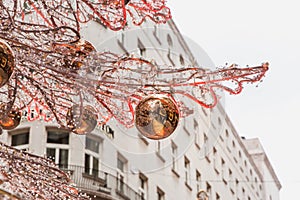 Christmas tree and decorations close-up on one of the fashion streets in Budapest, Hungary.