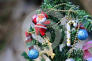 Christmas tree with decorations on a special background blur