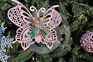 Christmas tree decorations and toys for fir trees covered with snow and ice. Close-up. Happy New Year and Merry Christmas.