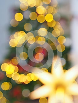 Christmas tree with defocused lights and star