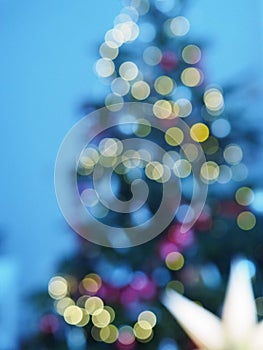 Christmas tree with defocused lights and star