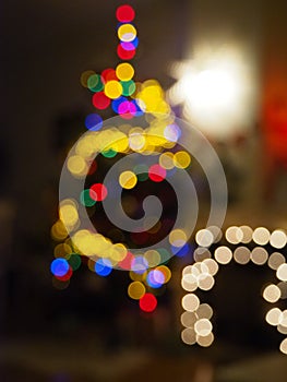 Christmas tree with defocused lights and star