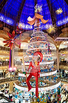 The Christmas tree and the Elf at Galeries Lafayette in Paris, France