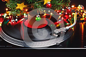 Christmas tree and festive turntable with colorful led lights