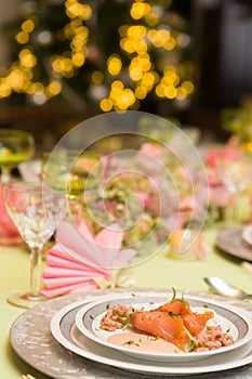 Christmas tree and fine dinner table