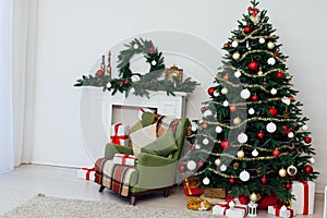 Christmas tree with fireplace interior of white room new year decoration garland gifts