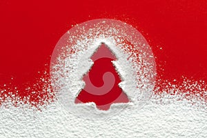 Christmas tree floury snow shape, red paper background