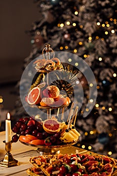 Christmas tree fruit salad with melon,blueberry, grape and water