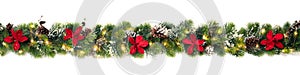 Christmas tree garland decorated with red christmas poinsettia flowers and shiny led lights, festive banner