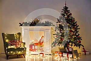 Christmas tree garland lights with gifts of new year holiday winter