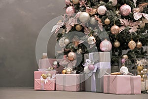 Christmas tree and gifts on a background