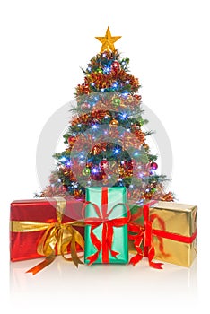 Christmas tree with gifts in front