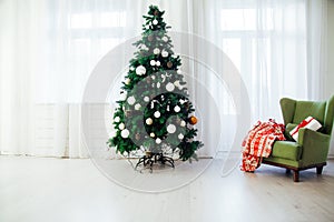 Christmas tree with gifts in the interior of santa`s house decor for the new year as a background