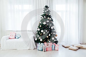 Christmas tree with gifts in the interior of santa`s house decor for the new year as a background