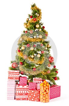 Christmas tree with gifts and presents and mandarines
