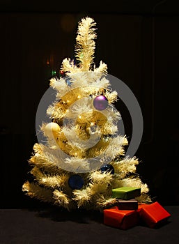 Christmas tree with gifts under it