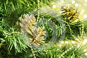 Christmas tree with golden decorations, holiday new year background