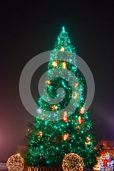 Christmas tree with green glowing lights