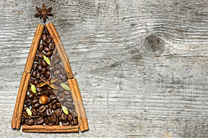 Christmas tree greeting card made of cinnamon and coffee