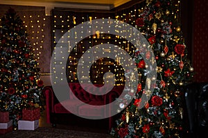 Christmas tree holiday home interior lights garlands, and home decorations.