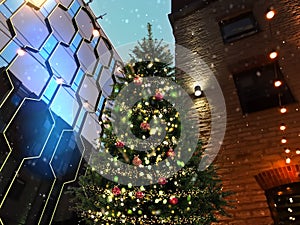 Christmas tree illumination and modern buildings in center in the city,winter holiday ,urban scene