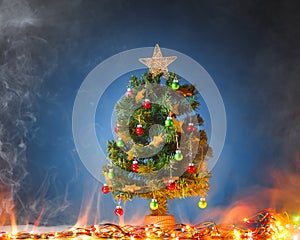 Christmas tree with light in smoke