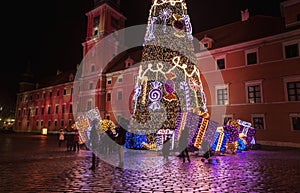 CHRISTMAS TREE, LIGHTINGS IN OLD TOWN, WARSAW, POLAND.