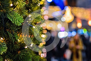 Christmas Tree Lights with Blurred Street Lights Background.