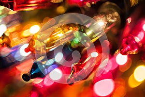 Christmas tree lights bulbs closeup on bokeh colorful