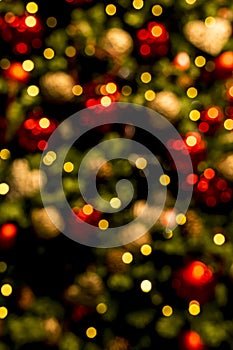 Christmas tree with lights and ornaments blurred photo