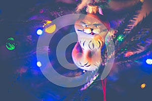 Christmas tree lights and toy cat