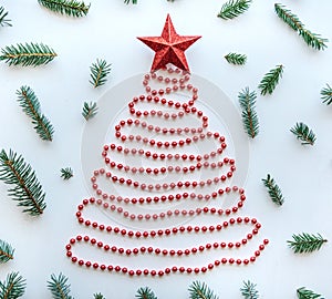 A Christmas tree made of beads and a star on top. Celebratory concept.