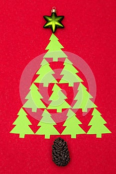 Christmas tree made from little green paper christmas trees