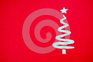 Christmas tree made of white flour on red background. Christmas bakery and cooking creative minimal concept. Flat lay
