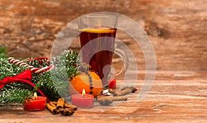 Christmas tree, mandarine, glogg and candles photo