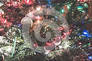 Christmas tree with many ornaments with led lighting bulb