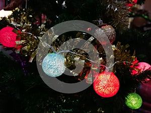 Christmas tree ornaments, colorful light balls on Christmas tree