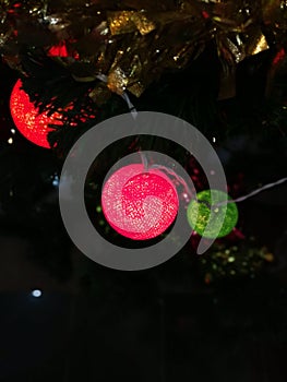 Christmas tree ornaments, colorful light balls on Christmas tree