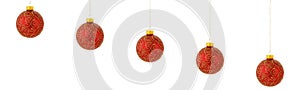 Christmas tree ornaments hanging on white
