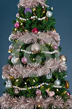 Christmas tree with ornaments, lights, and decor