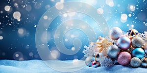 Christmas Tree Ornaments And Snow In Blue Background With Shiny Lights