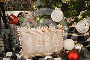 Christmas Tree Pillow Displayed Under Tree photo
