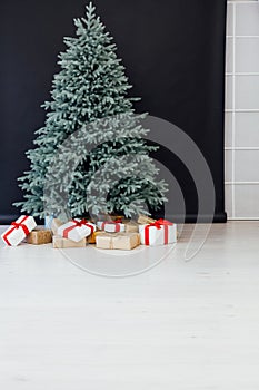 Christmas tree pine decor presents New Year`s Eve house background 2021 2022