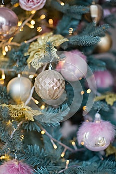 Christmas tree with pink gold decorations